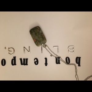 140 ctw. Unakite Stone setting of Silvertone.